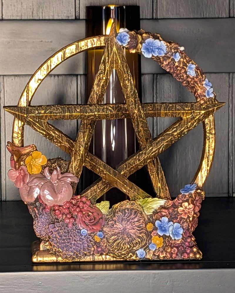 Season of the Pentagram Ostara Spring figurine, full front view with pink and blue flowers