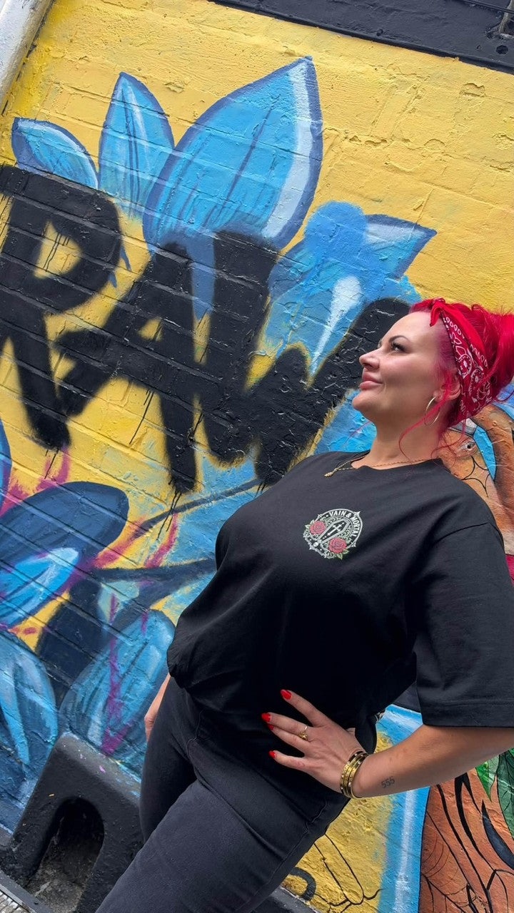 Hollie wearing the VAIN & MORTAL heavyweight organic T-shirt with the full back artwork visible