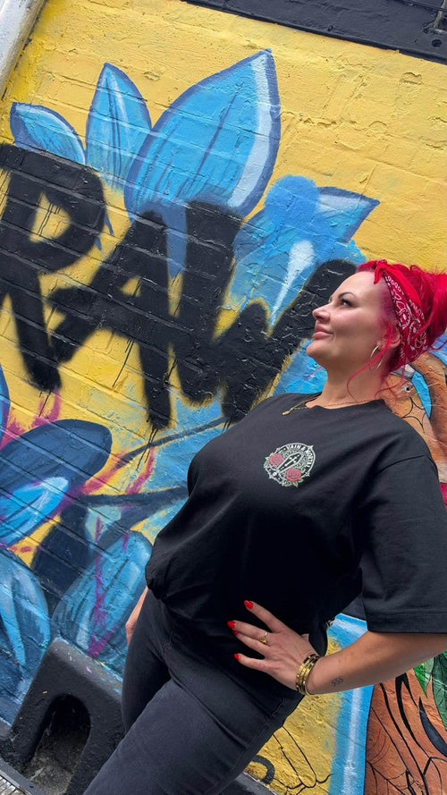 Hollie wearing the VAIN & MORTAL heavyweight organic T-shirt with the full back artwork visible