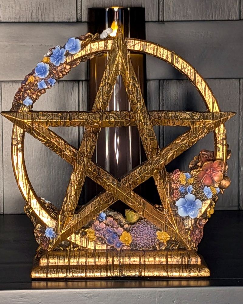 Ostara spring pentagram with pastel flowers